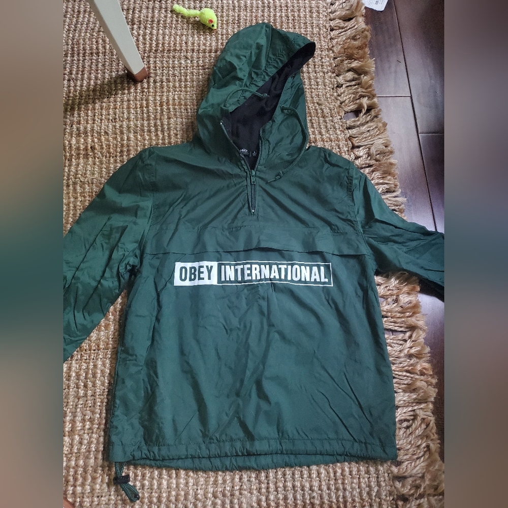 Insulated green rain jacket with 1/4 zip by Obey   international size small mens